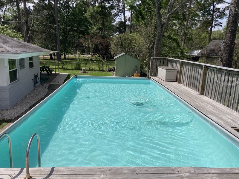 The same rectangular pool with clear, light blue water